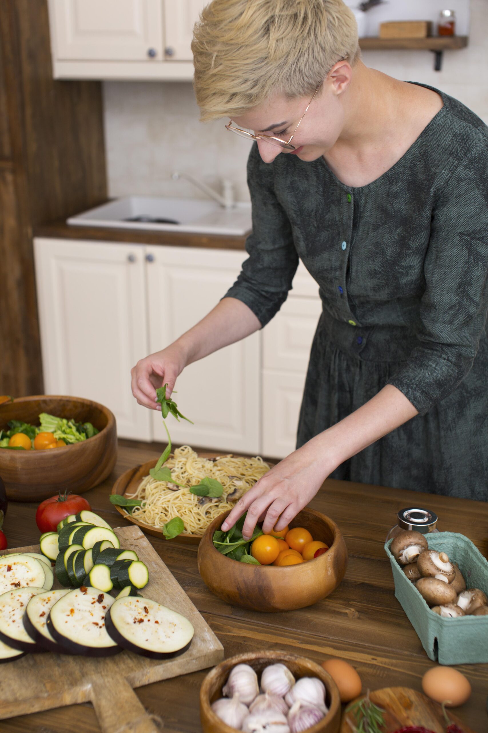 "Woman cooking healthy food at home, reflecting cooking confidence and measuring for nutrition equity.